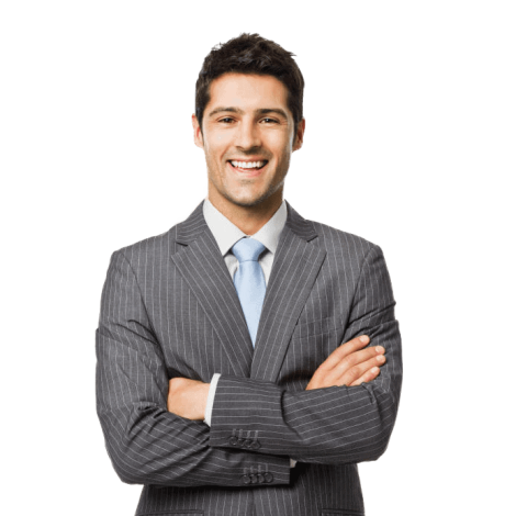 Businessman smiling in a gray suit with crossed arms, showcasing confidence and professionalism.